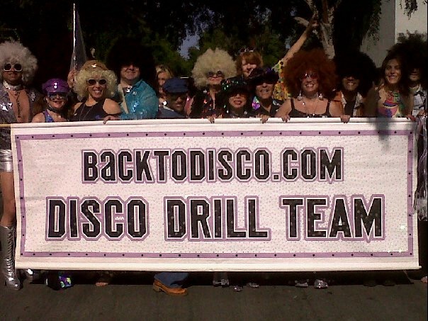 Performed in Doo Dah Parade Disco Drill Team (Big yellow Afro in the center)