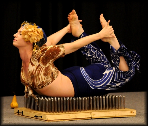 Yes, its real! Bed of Nails act available in a wide variety of costumes. Body paint too upon request.