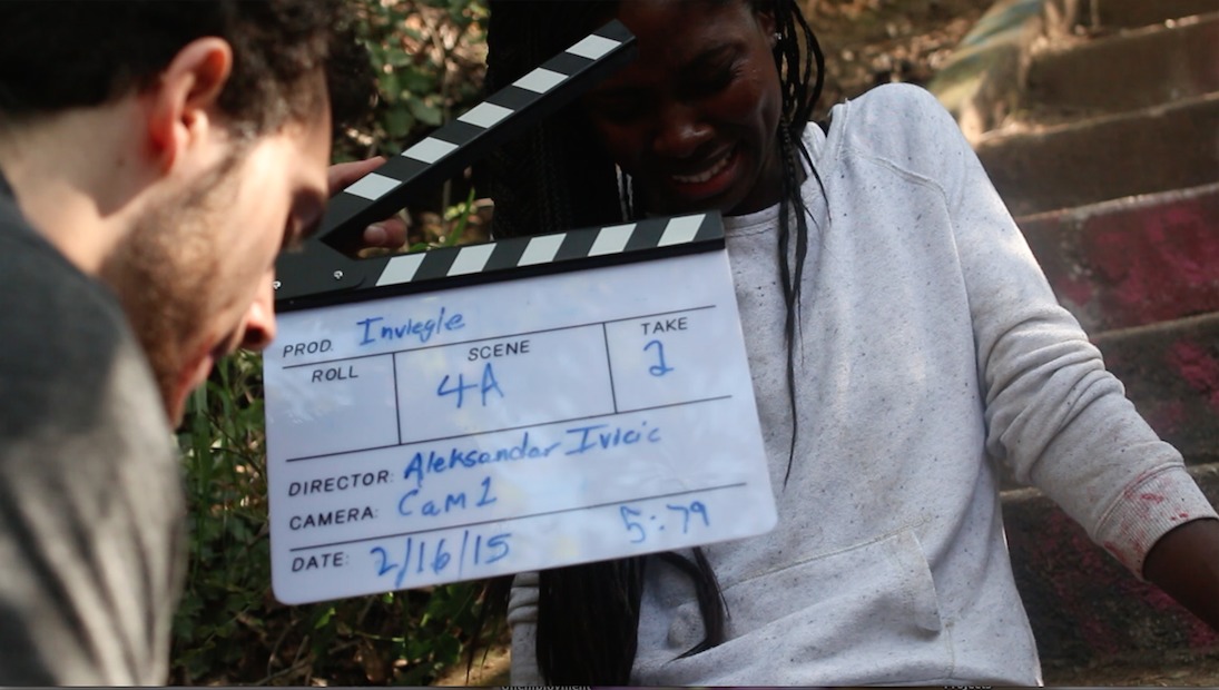 Still of Vishani and Mike Sarcinelli,on location filming 'Inveigle'.