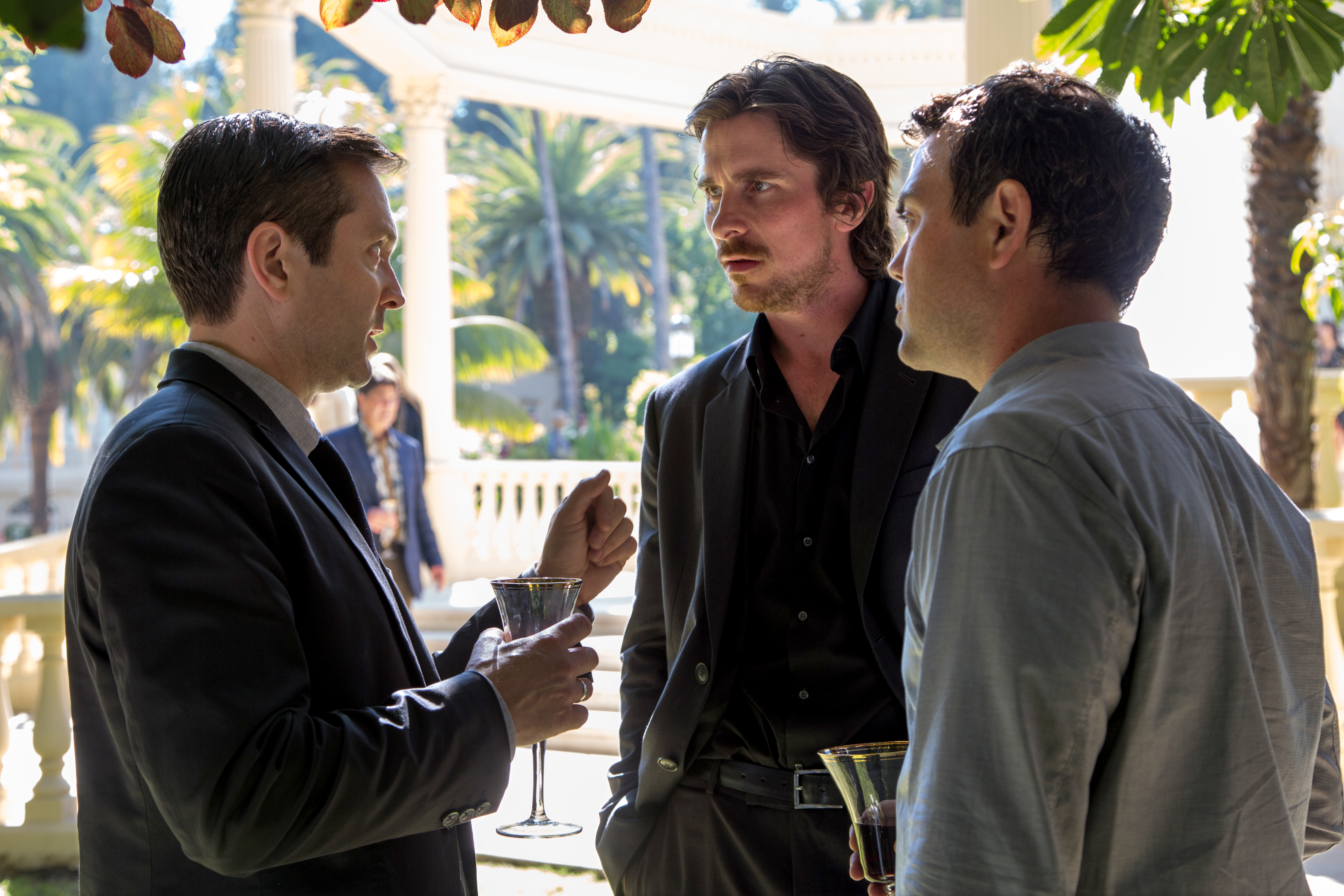 Still of Christian Bale, Thomas Lennon and Joe Lo Truglio in Knight of Cups (2015)