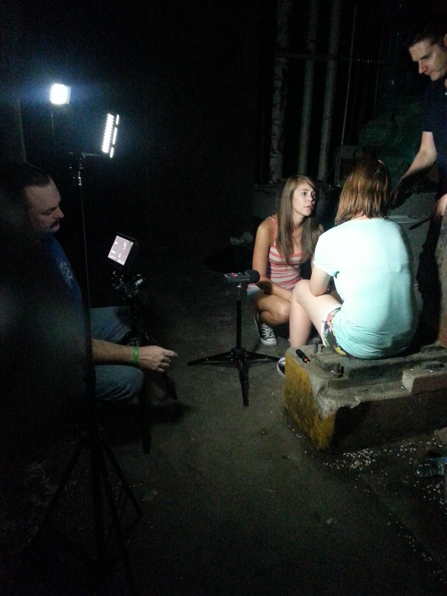 The Lowpriest directing Chris Carter, Sara Jackson, and Rachel Shatto in Road Trip.