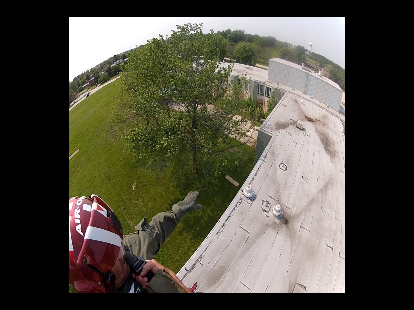 Photo was taken of Garret Kaminskis on approach for landing on the roof of the old Tinley Park, IL Medical Complex during an exercise.