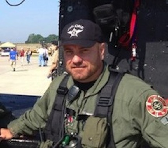 Photo of Garret Kaminskis was taken during the Waukegan Airport Air Show as part of a static display and Vietnam War era dust-off demonstration.