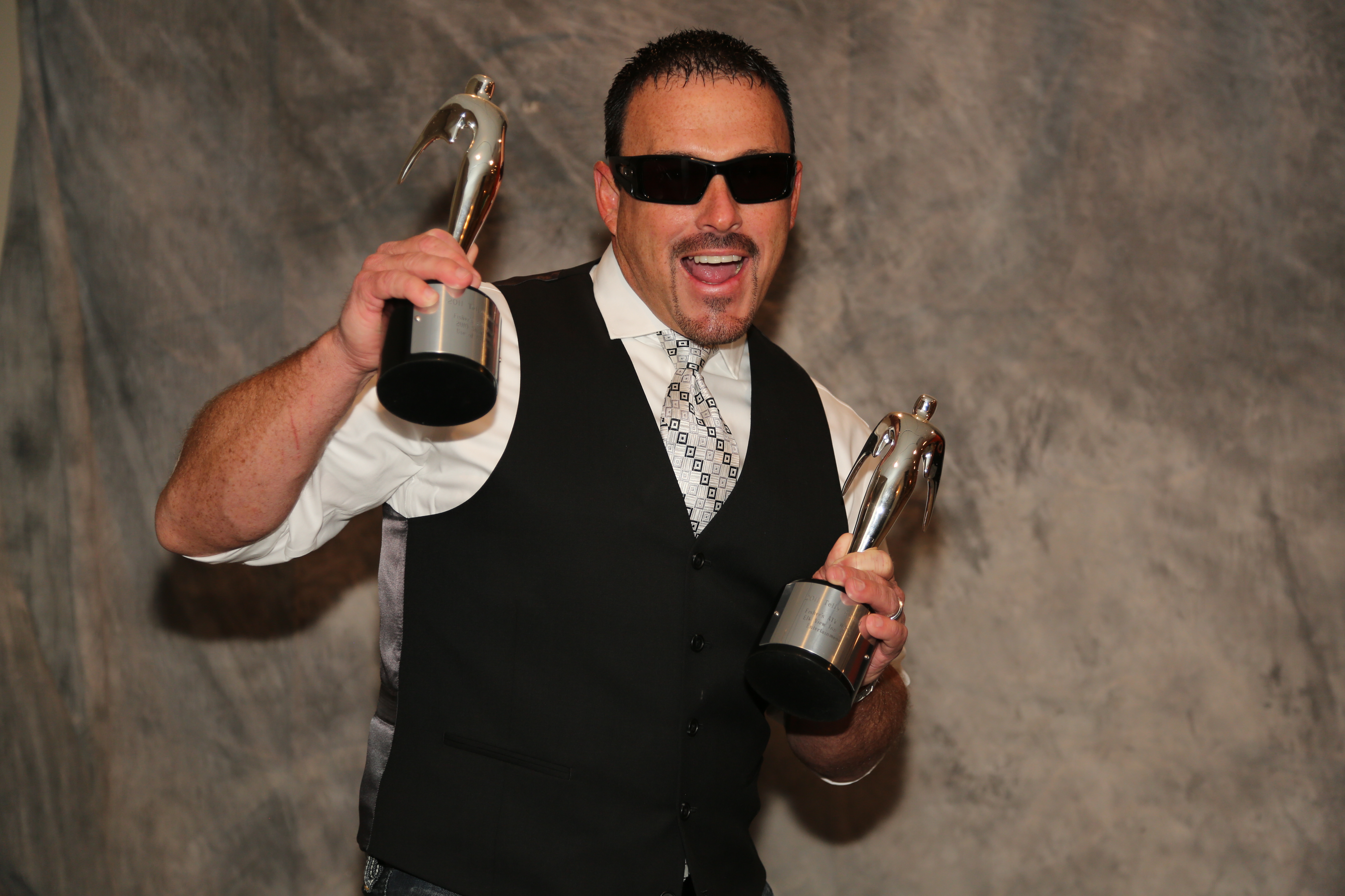 Brian won a few silver Telly Awards for Hosting the TV Show, Fisher's ATV World
