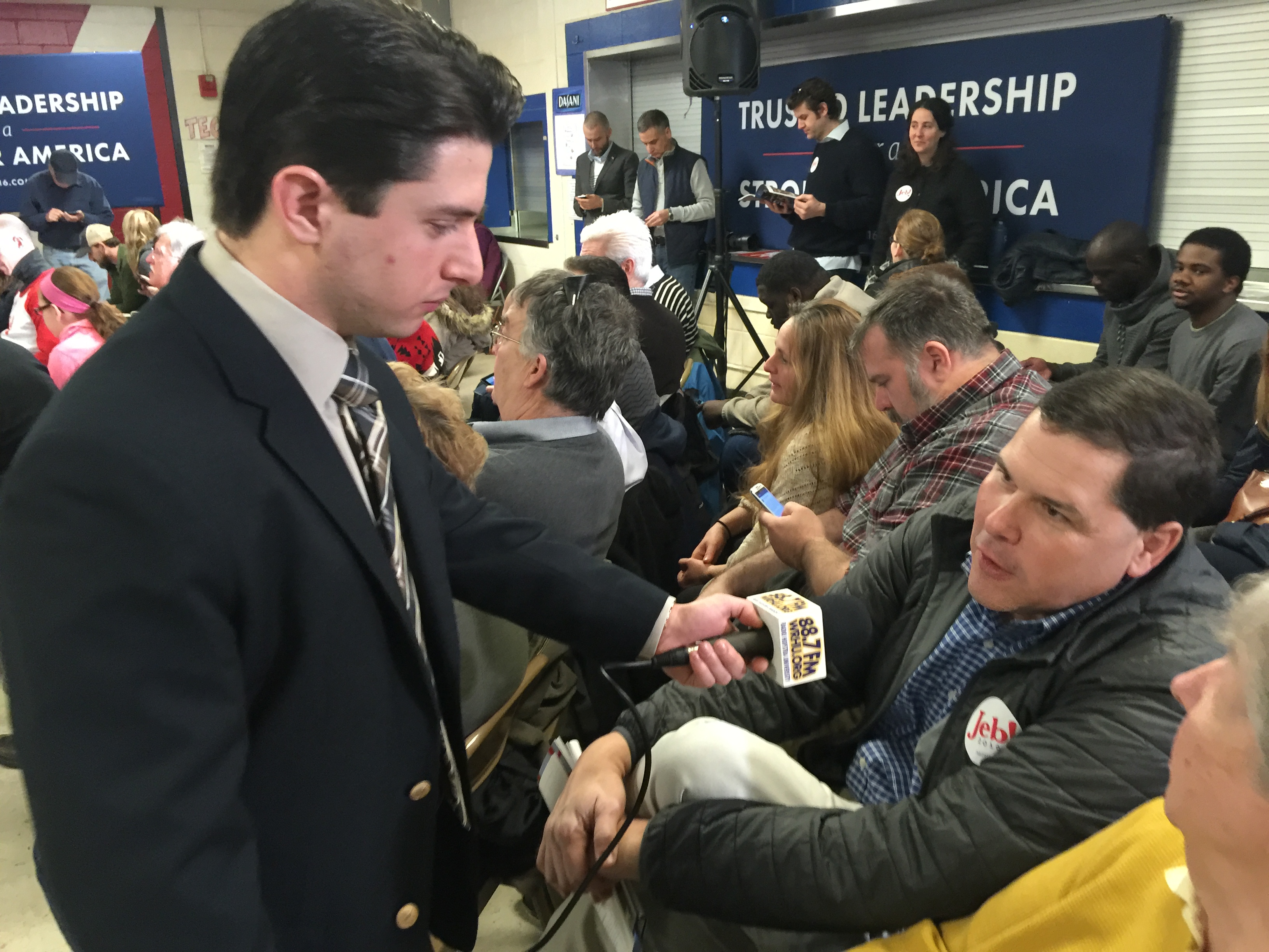 Neil A. Carousso interviews a Jeb Bush supporter at a Bush rally in New Hampshire.