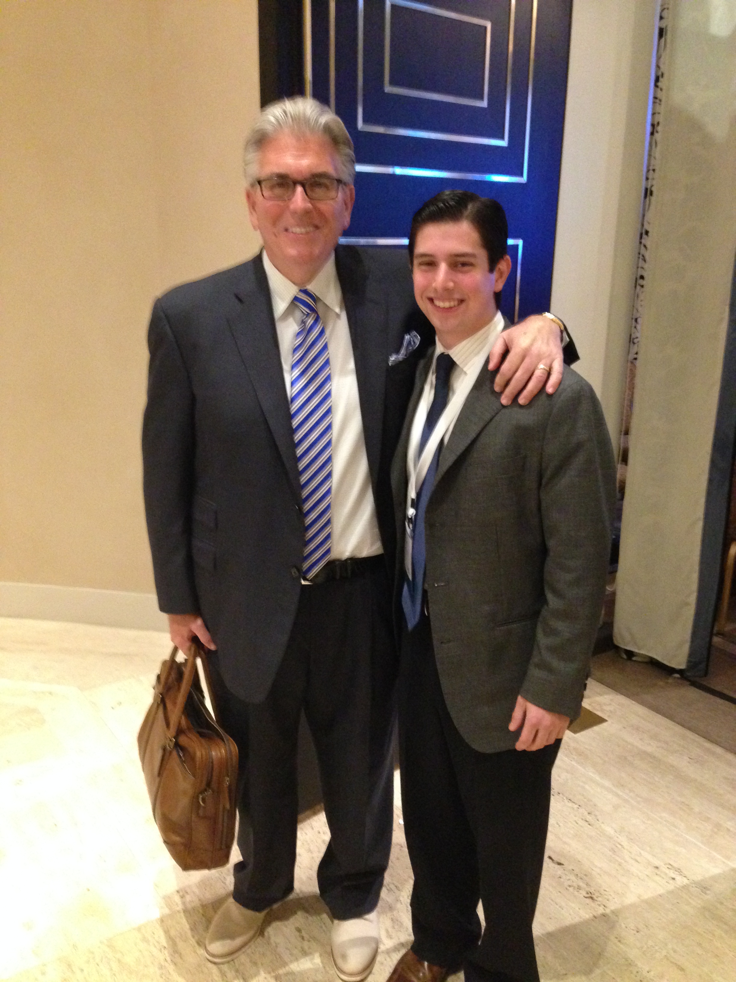 Sports talk show host Mike Francesa (left) poses for a picture with Neil A. Carousso at an event in New York City