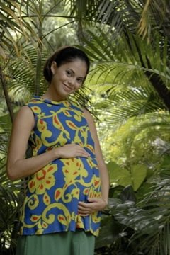 Clara- pregnant in Banco Popular Viva Navidad Production