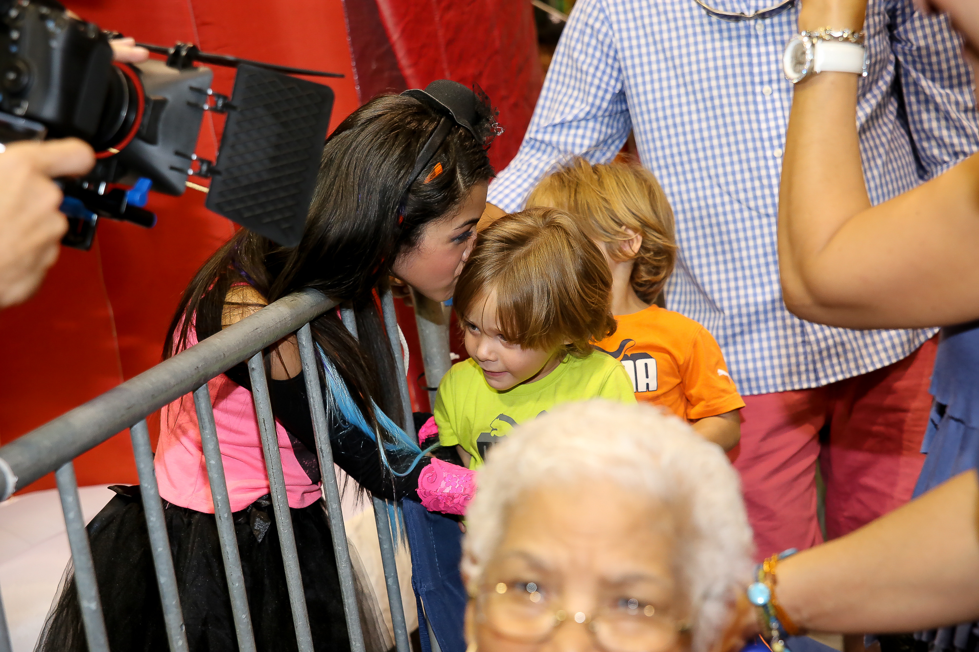 Alanis Sophia after her performance in the Tampa Family Health Fair meeting her fans