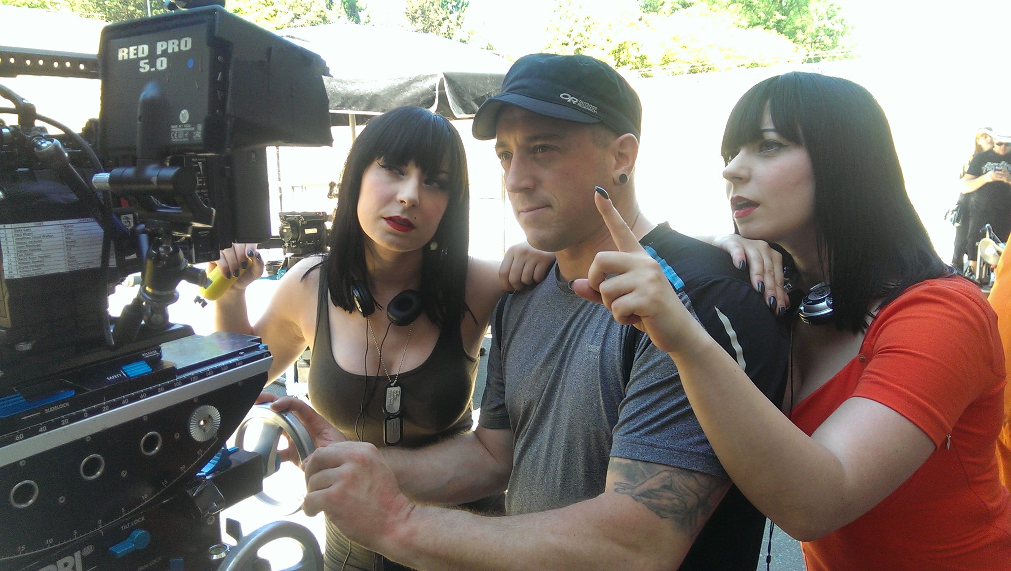 Jen Soska (left) and Sylvia Soska (right) on the set of Vendetta with A Cam/Steadi Cam Op, Chris Banting.