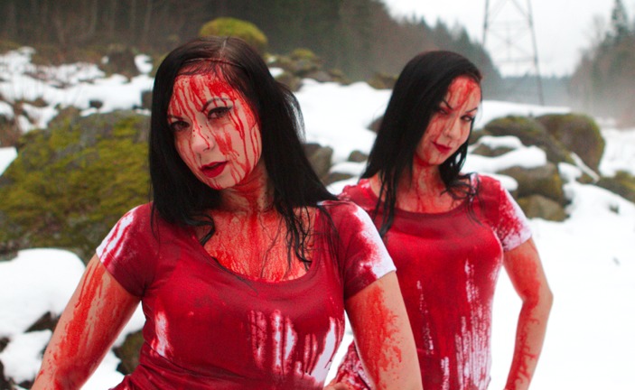 Sylvia (left) and her twin sister, Jen (right), on the set of their fourth Massive Blood Drive PSA.