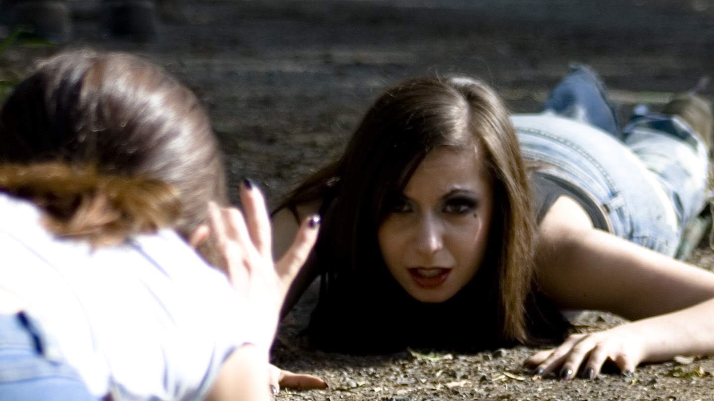 Sylvia (right) with her twin sister, Jen (left), on the set of Dead Hooker in a Trunk.