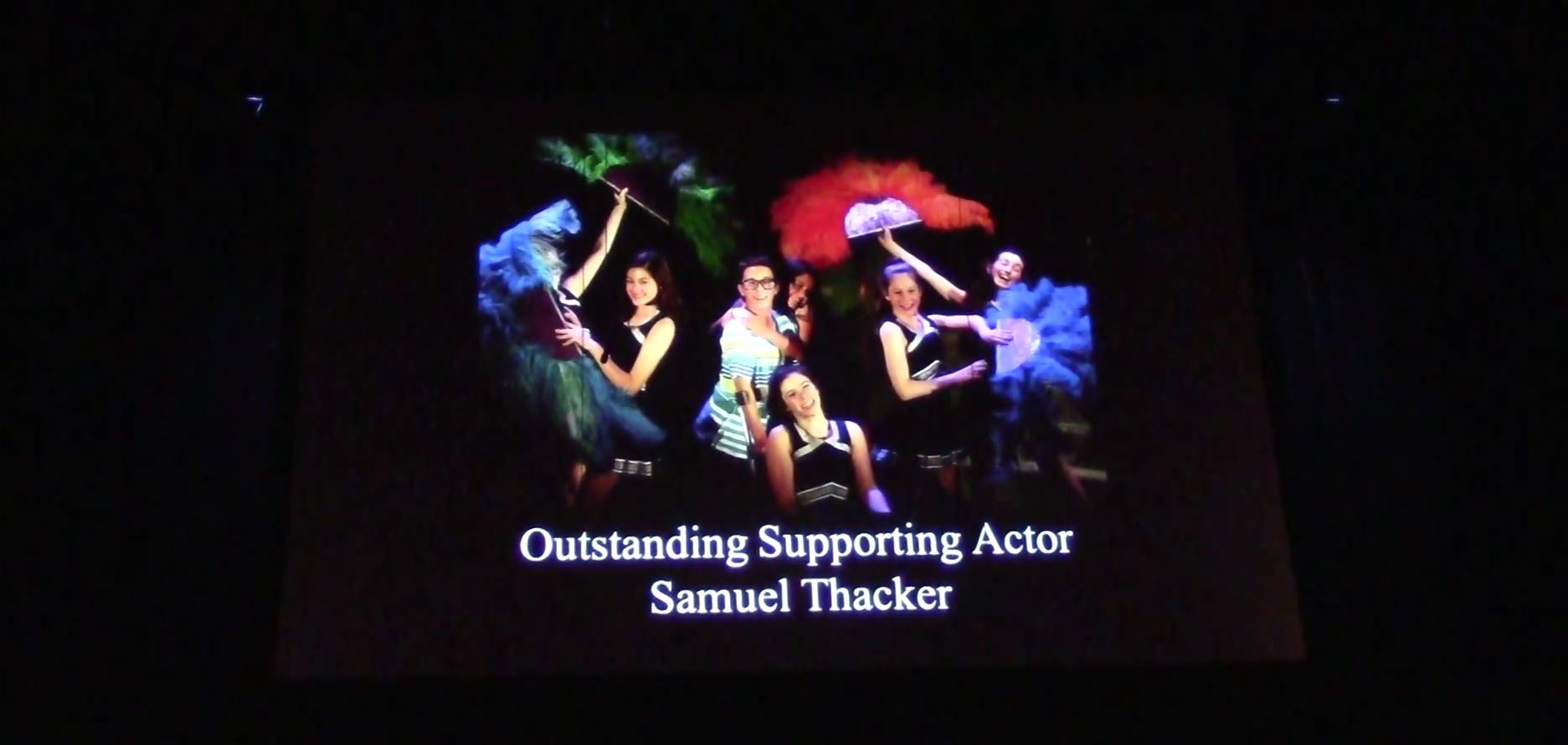 Screen announcing Samuel's National Youth Awards win for Outstanding Supporting Actor in a Musical for his performance as 