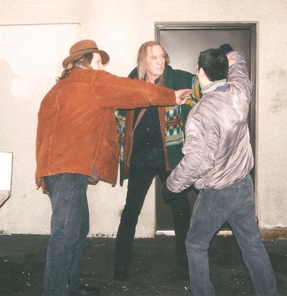 Michael Dawson and David Carradine work out a fight scene on location shooting 