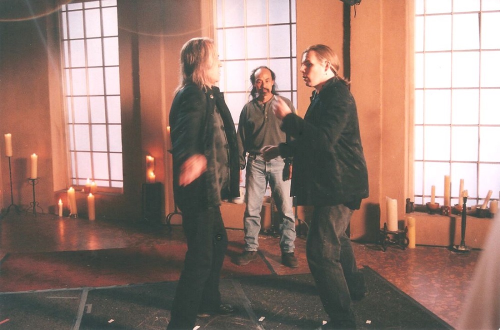 David Carradine, Al Leong and Michael Dawson work out fight choreography on the set of 