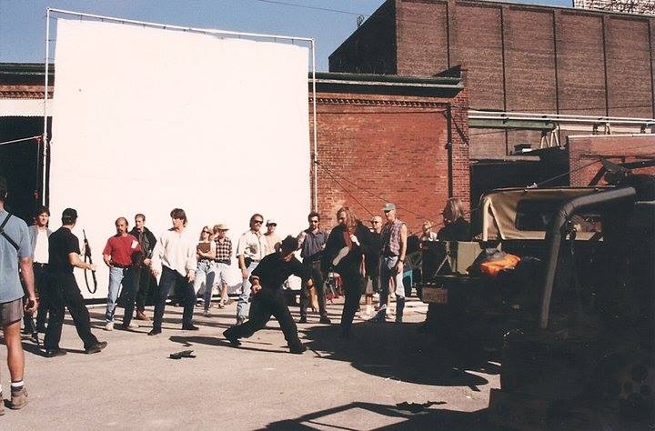 Michael Dawson, Al Leong, David Carradine, Chris Potter - and many other cast and crew members - rehearse a fight scene on location shooting 