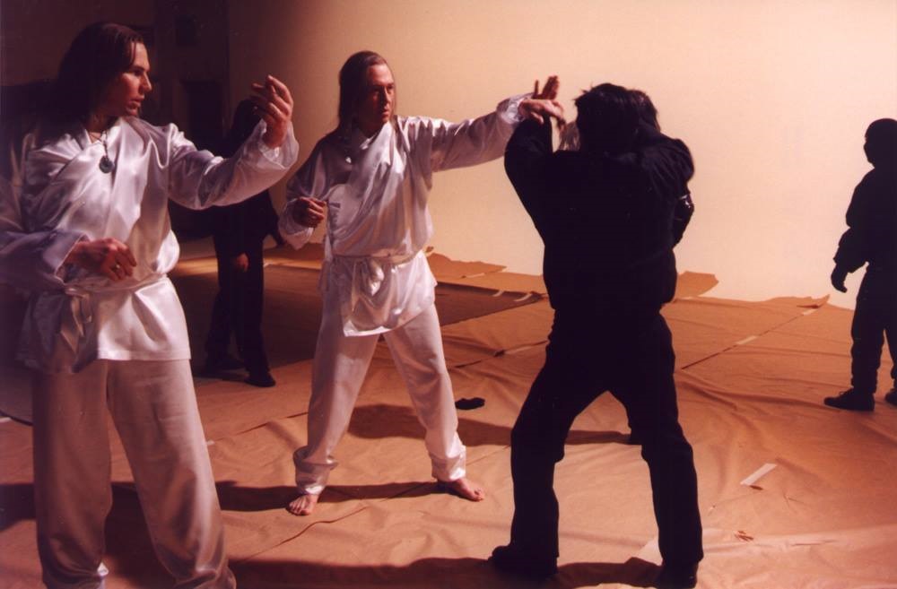 Mike Dawson (a.k.a. Michael Dawson) works out a fight scene with David Carradine and Ho Chow on the 