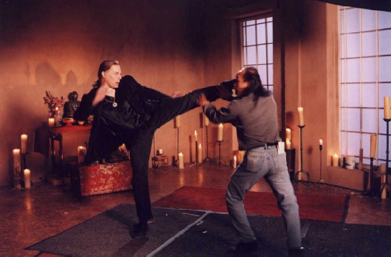 Michael Dawson (stunt doubling actor David Carradine) and fight coordinator Al Leong work out fight choreography together on the set of T.V.'s 