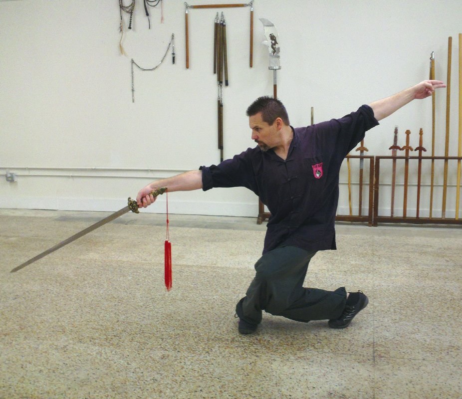 Michael Dawson with the Double-Edged Straight Sword, performing the traditional Tai Yu Sword Form from Tai Chi Chuan (2014).