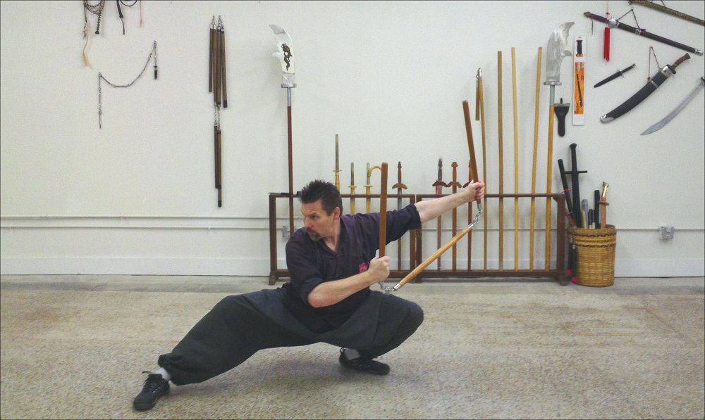 Michael Dawson with the Three-Sectional Staff, a traditional advanced kung-fu weapon (2014).