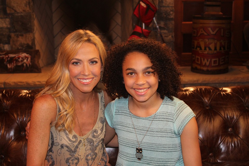 With Singer Sheryl Crow on set for the commercial of cool new product, Electric Jukebox.