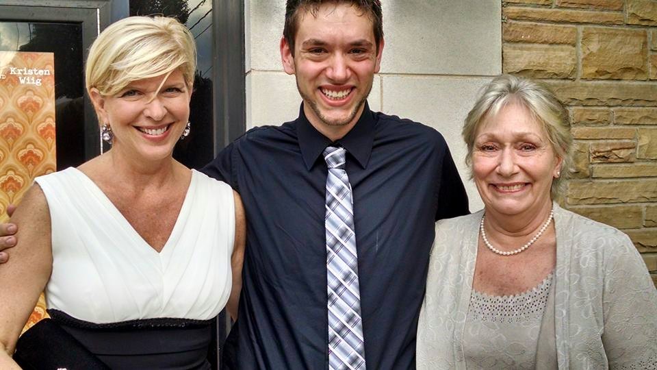 Brandon Seth Chinault (center) with fellow actress Rebecca Rogers (left) and his mother Kay Corvin (right) at the premiere of Badge of Faith (2015).