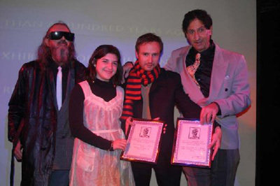 Daniel Frei receiving Best Director Award for a Short Film, for OFF HOUR, and receiving for Adrian Grenier(absent at that time),Best Acting Award for a Short film,for OFF HOUR, at the NY INTERNATIONAL INDEPENDENT FILM AND VIDEO FESTIVAL 2007; left to right:Martin Pfefferkorn,Myriam Coppersmith,Daniel Frei,Claude Laniado