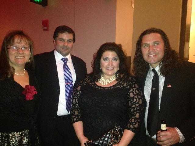 Lorna J Brunelle and husband Roger with Carlos Arrandando at an event in Boston