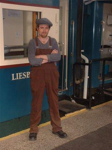 Dressed as a porter on an Adler clothing commercial.