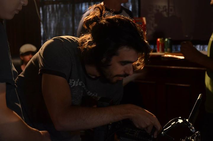 Álvaro Ortega operates the camera as the Cinematographer of the short film Rem (2014).