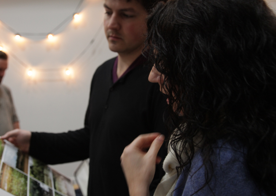 Producers Shari Aspinall and Daniel Kooman look over storyboards for She Has A Name.