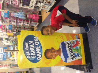 Brandin at Toys R Us with his Hasbro Commercial ad 2015