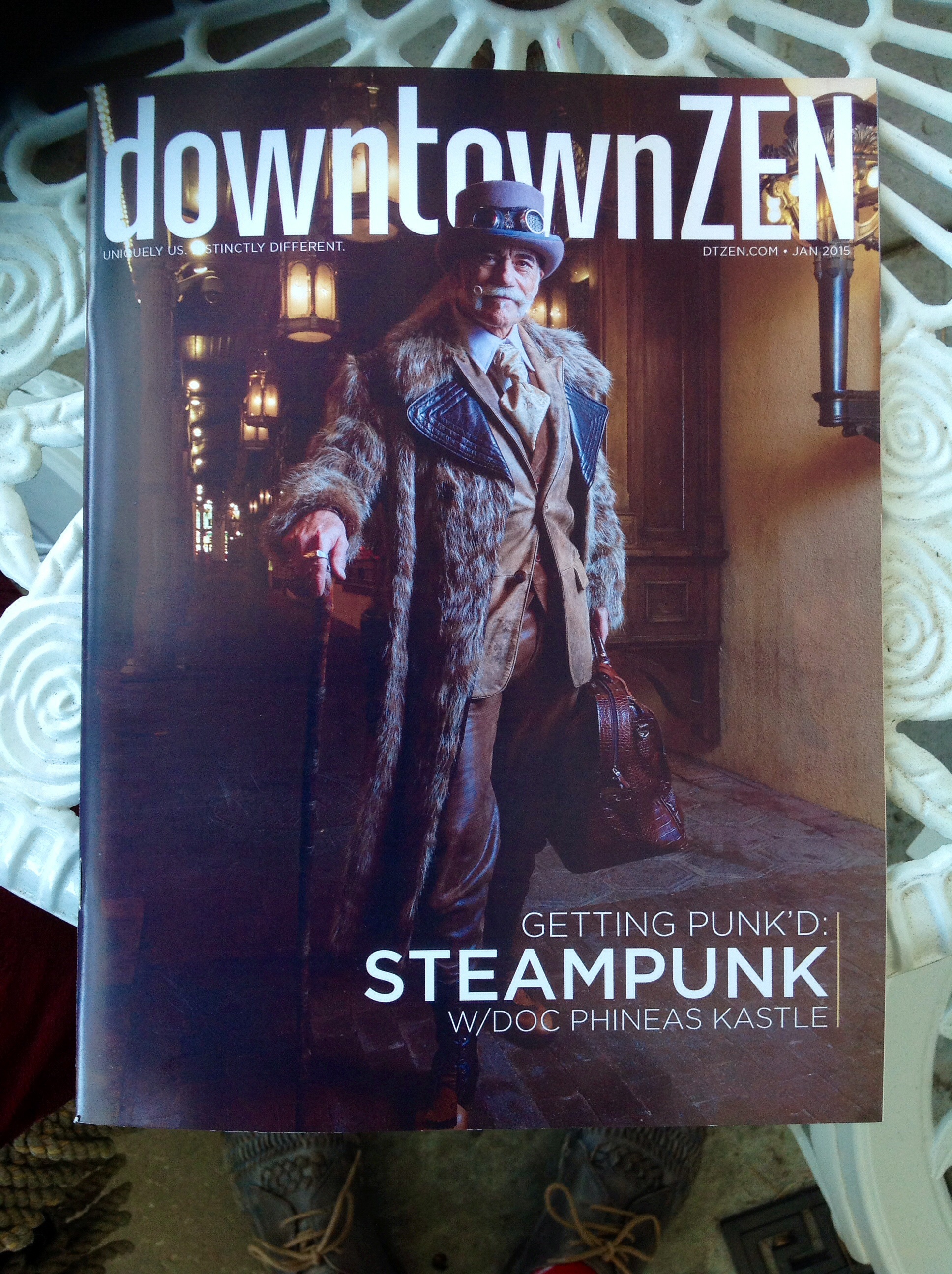Doc Phineas gracing the cover of Downtown Zen Magazine Jan 2015 with a 13 page editorial of his mivies, his popularity on TV, and being the world face of the Steampunk movement. Produced worldwide by Zappos