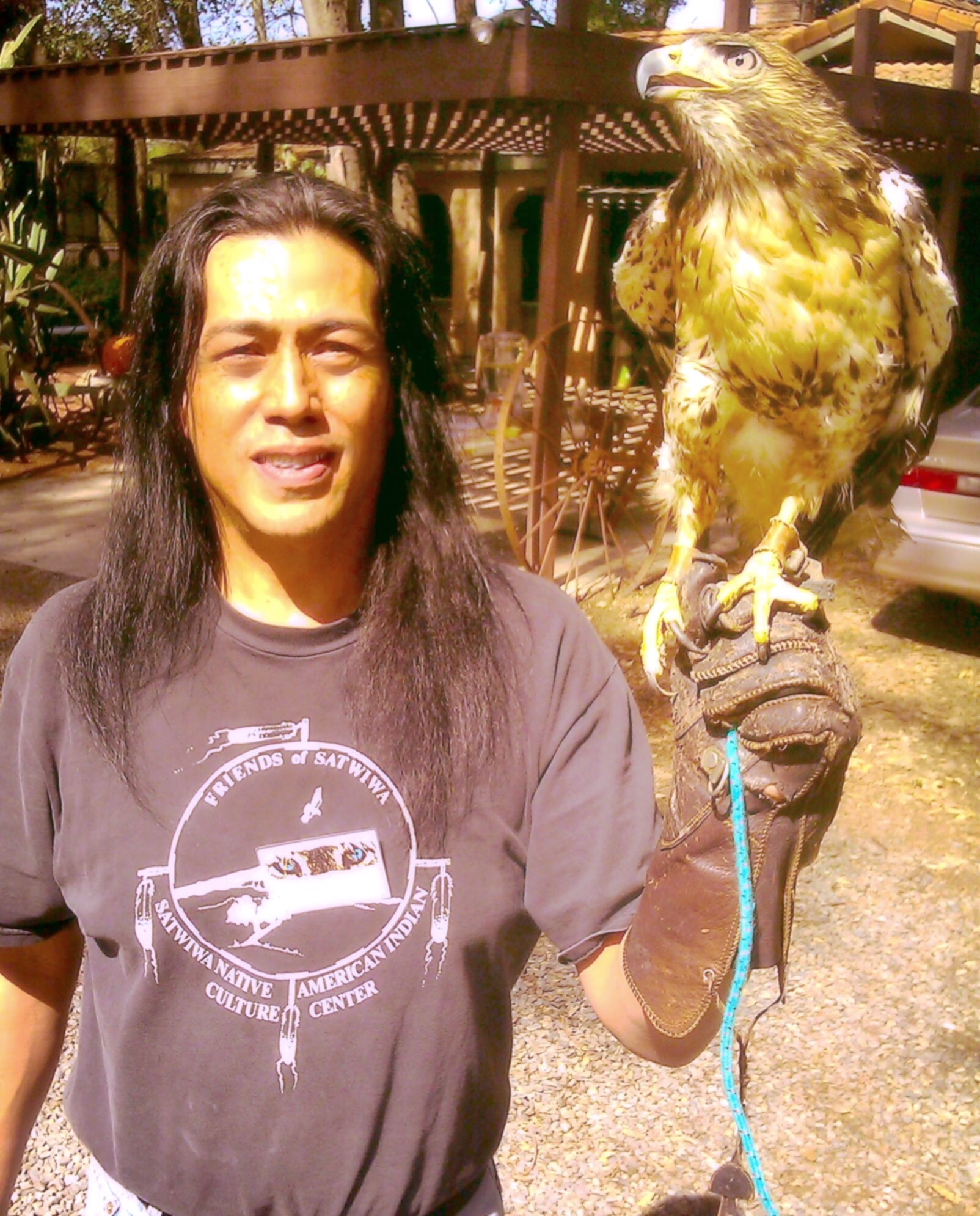 Tai Joseph Taylor with Golden Eagle at Wildlife Sanctuary.