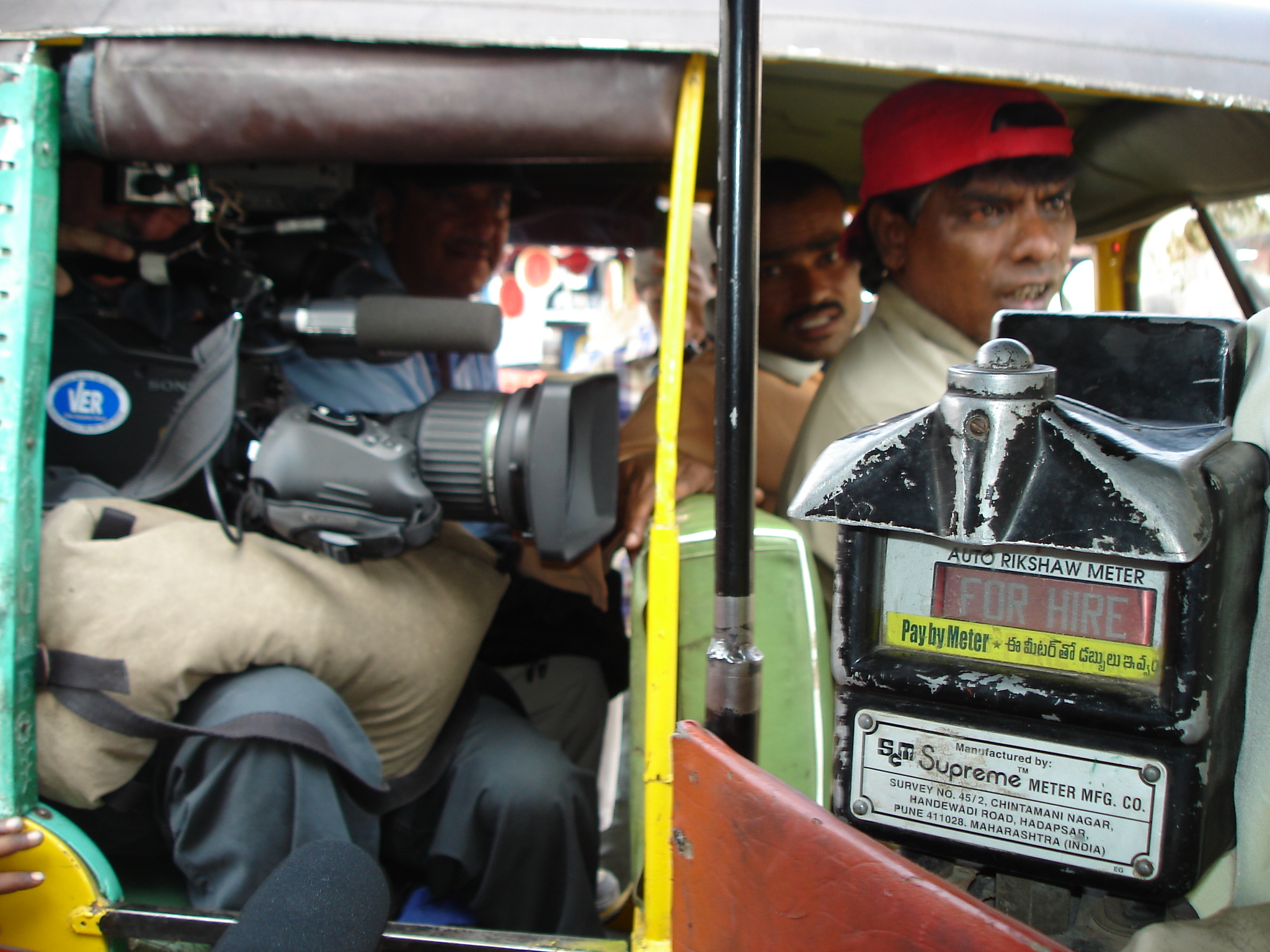 Impromptu shots in Hyderabad, India in side-by-side rickshaws.