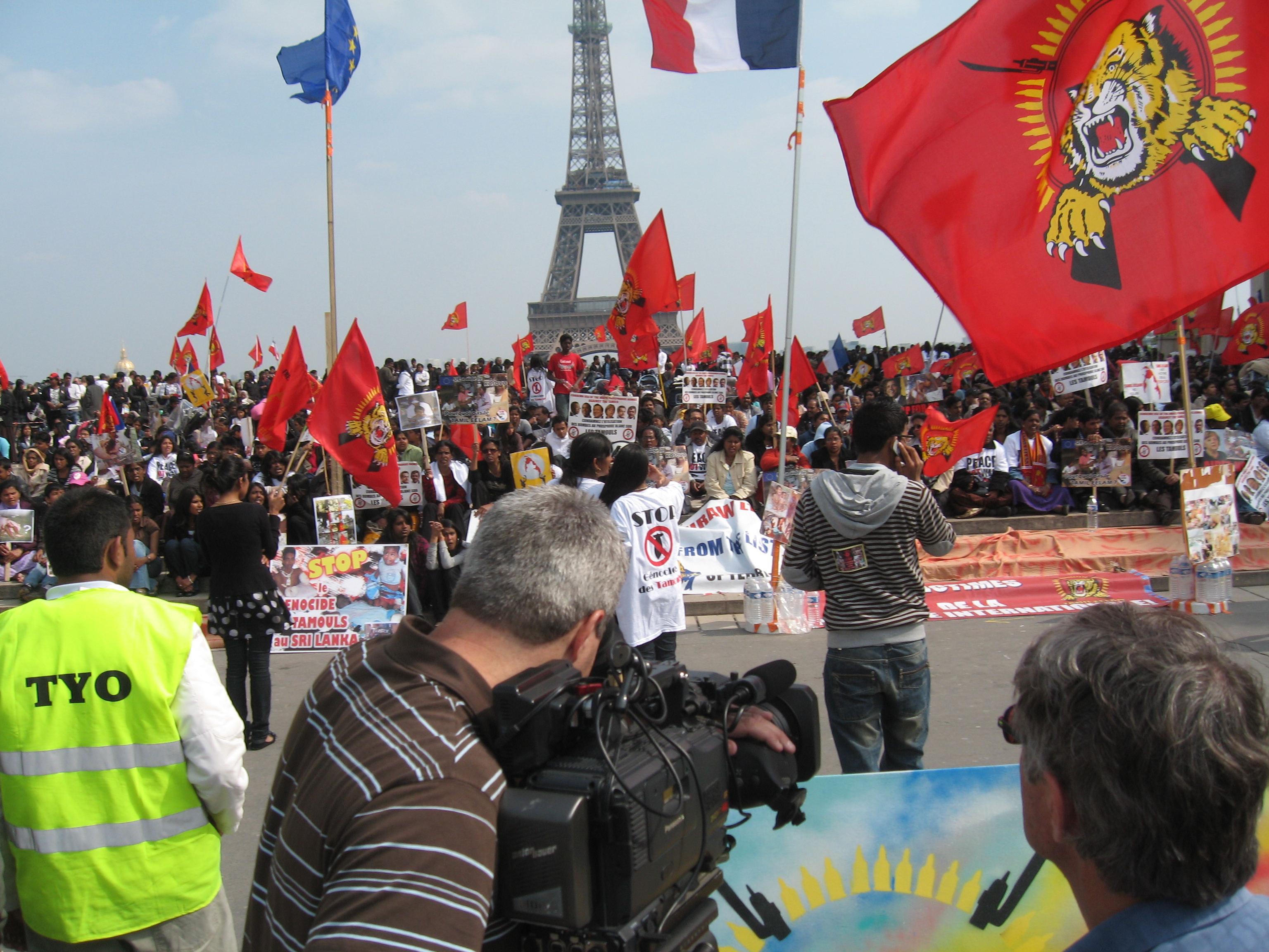 So do you have experience shooting a Sri Lanka protest in Paris? You're hired.