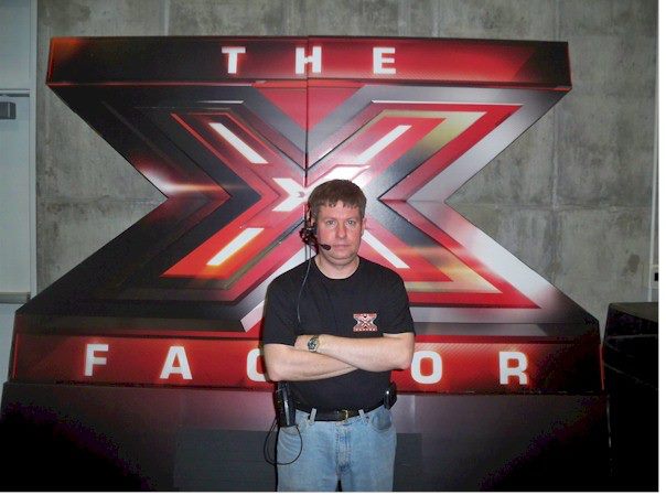 Here is a photo of me in KC working on X Factor. I was registering contestants for the compitetion. The main producter from the UK showed up. I helped line up a shot for him. There was an usual amount of contracts i had to sign to work on this. This is th