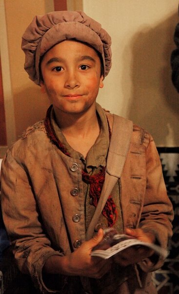 Julian Silva as Gavroche for the Les Miserables 25th Anniversary National Tour.