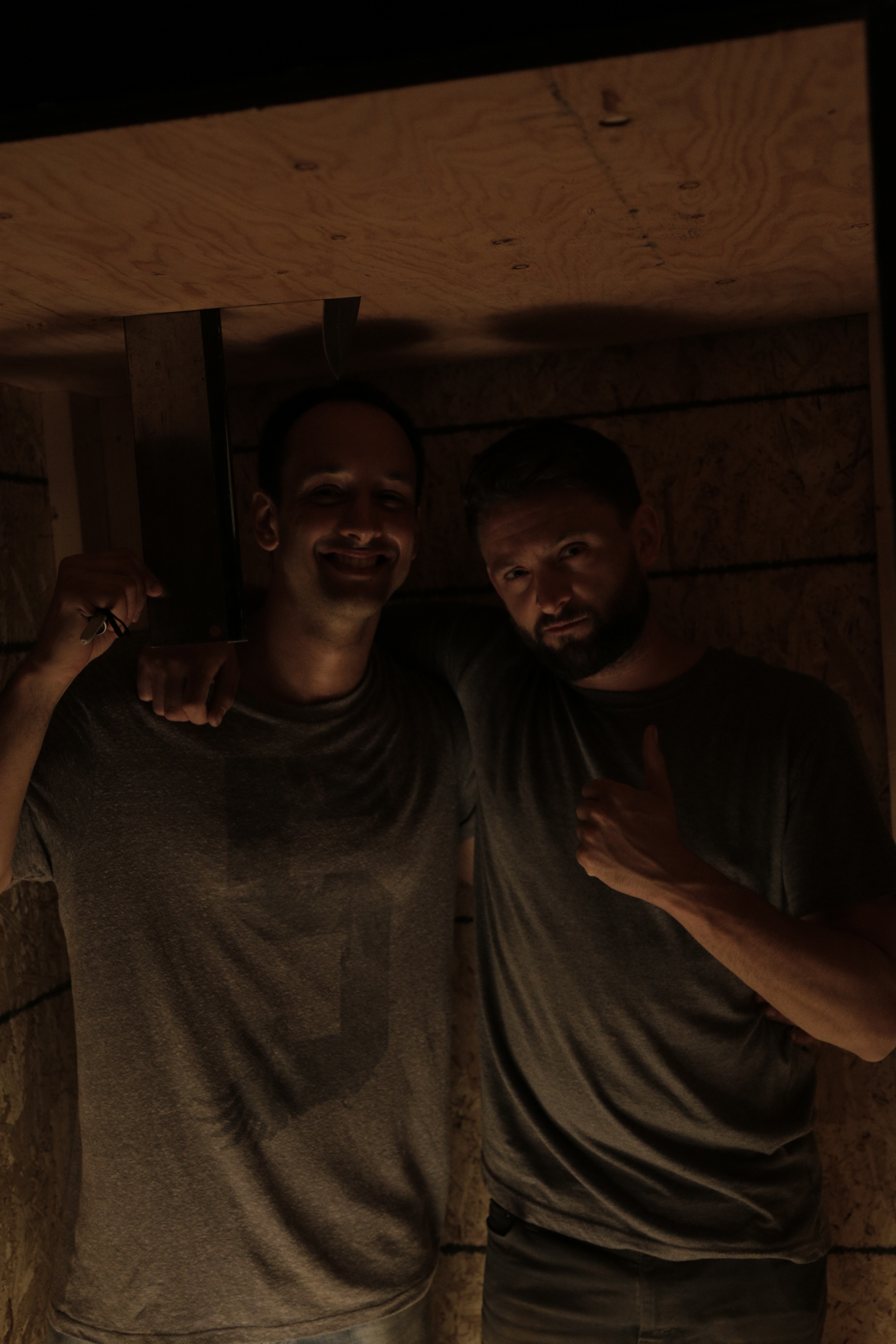 director Guina Dutra and actor Adam Wright, inside the mad box and moments before the shooting of the climatic scene in 'Goodbye Dear Madness' (2015)