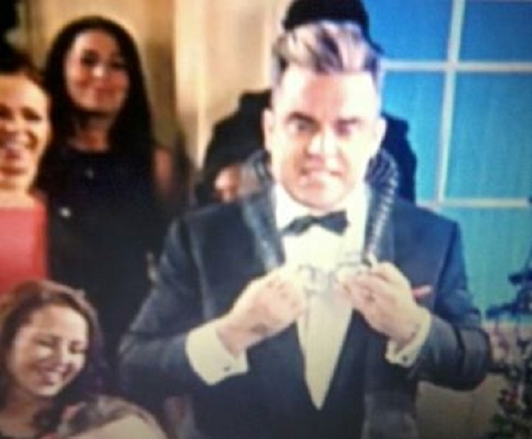 Taken from the making of Dream a little dream. I am standing behind Mr Robbie Williams
