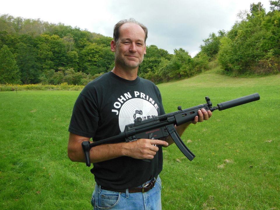 Tredd Barton with a full-auto MP5-N submachine gun.