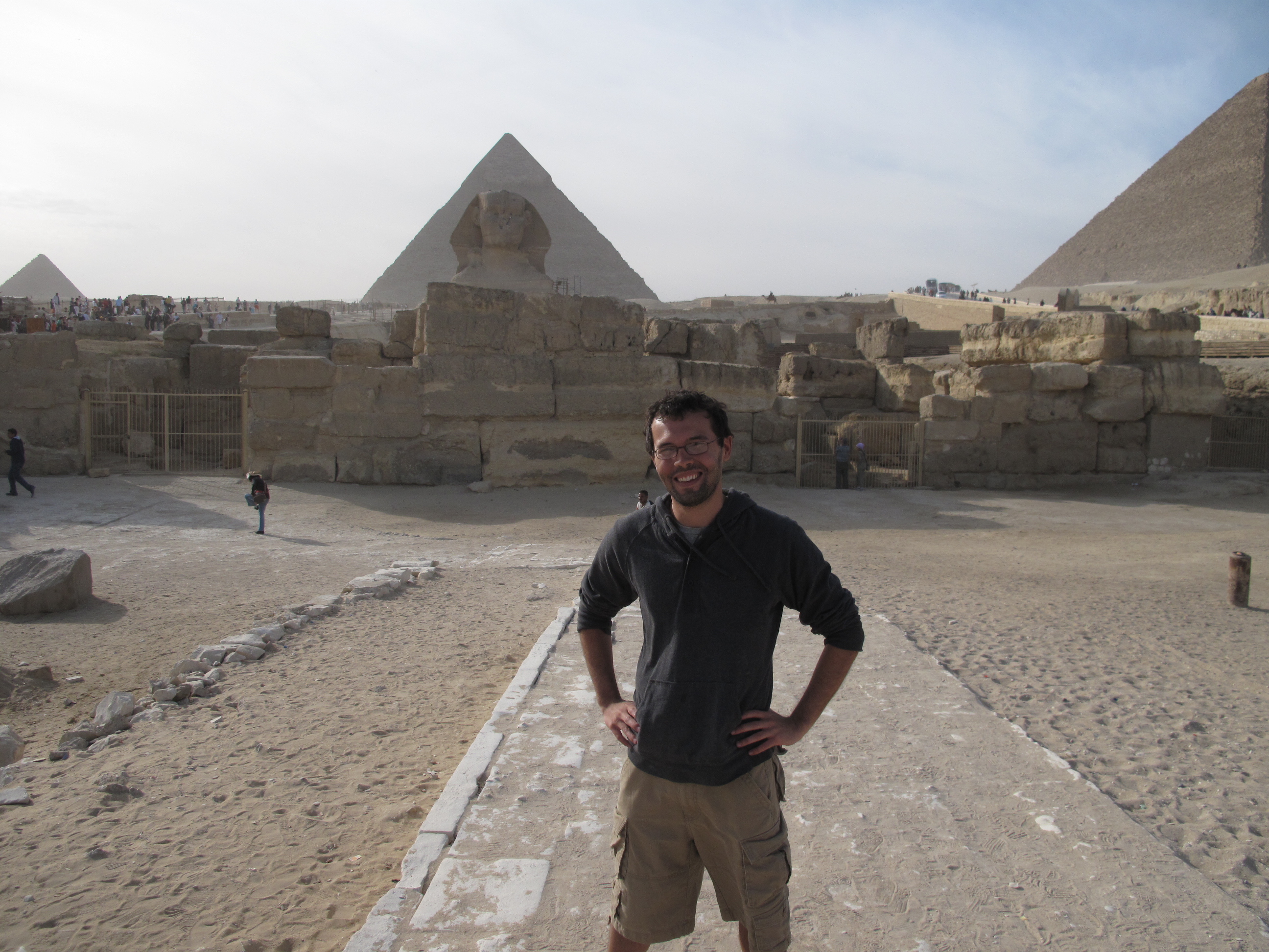 This is a picture of my in Egypt with the pyramids and the Sphinx behind me.