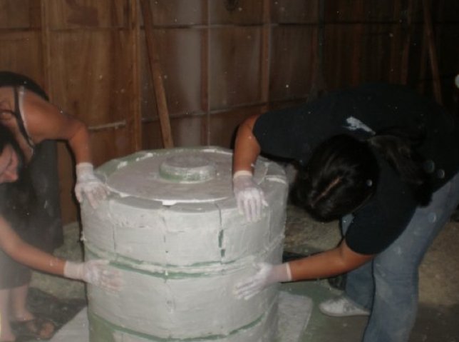 Alexa and Marissa plaster the Indiana Jones altar