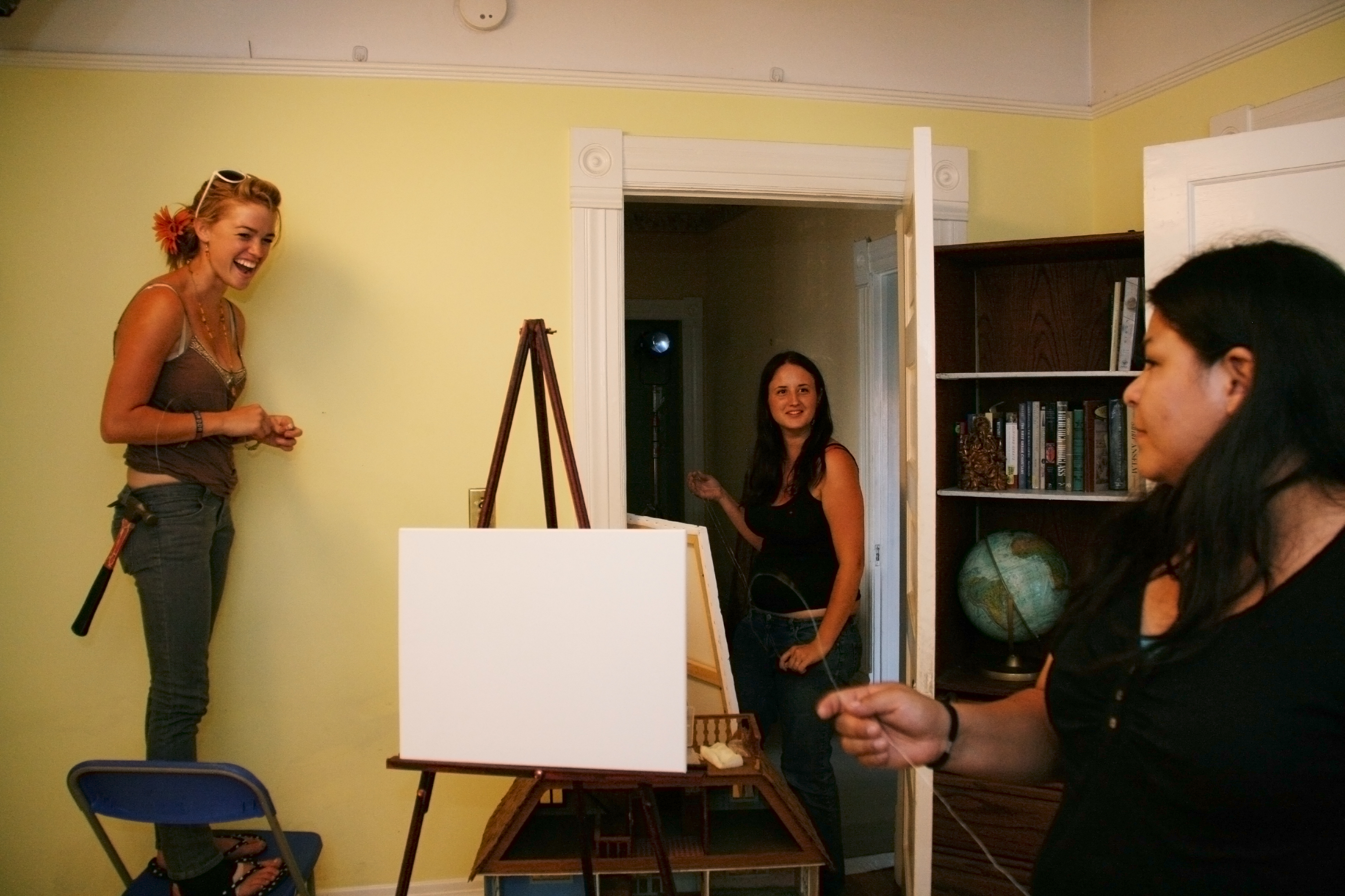Prop master Cara Mullins, Prod. Designer Alexa Roland, & Art Director Marissa Gallardo prepare Adalyn's bedroom