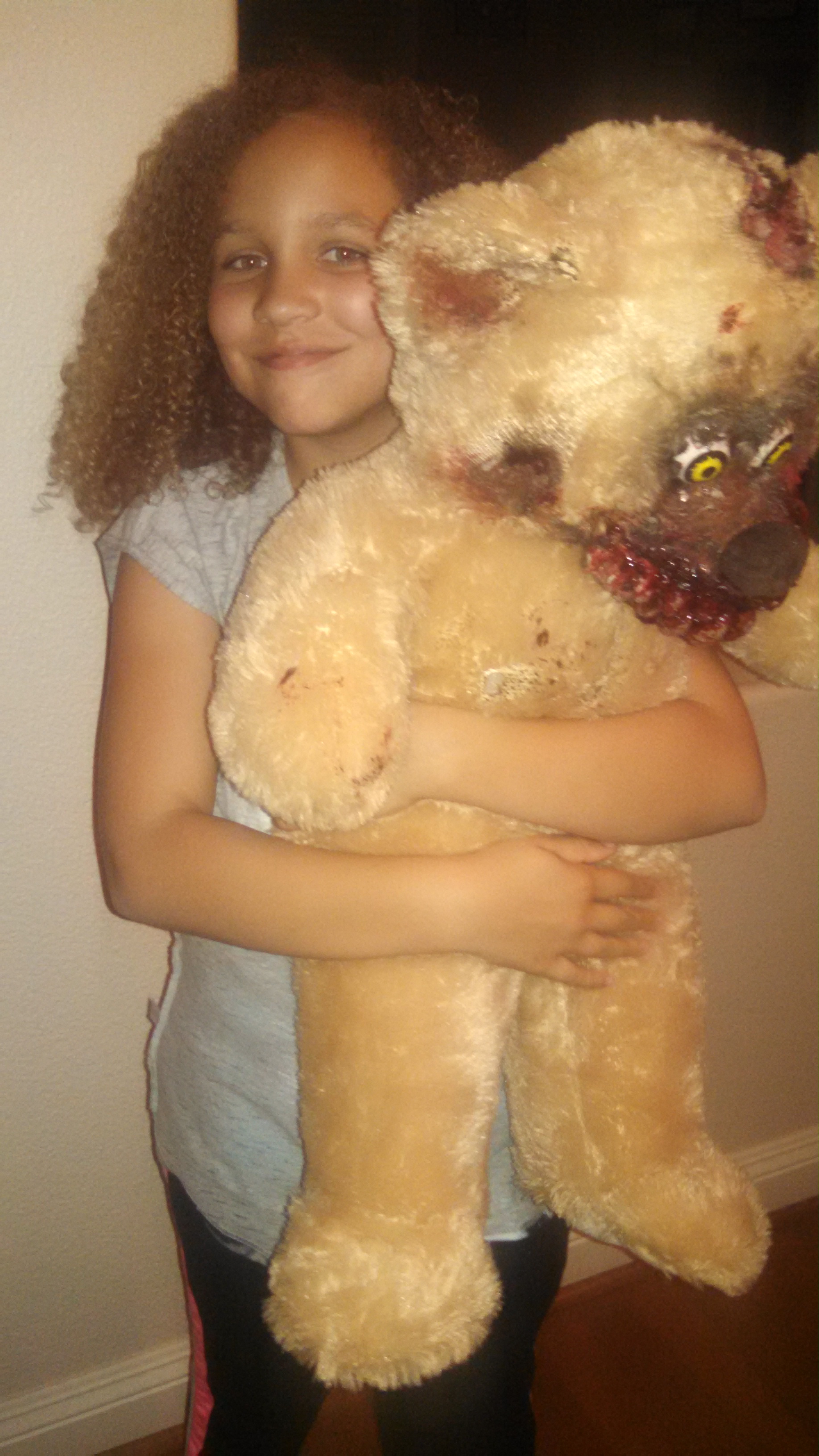 Tiana and the monster teddy bear.