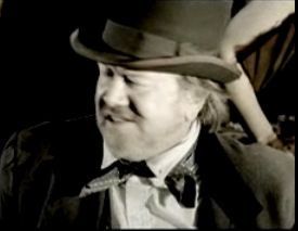 Old West Businessman, Big and Rich music video - Somewhere Between Heaven and Saving Grace