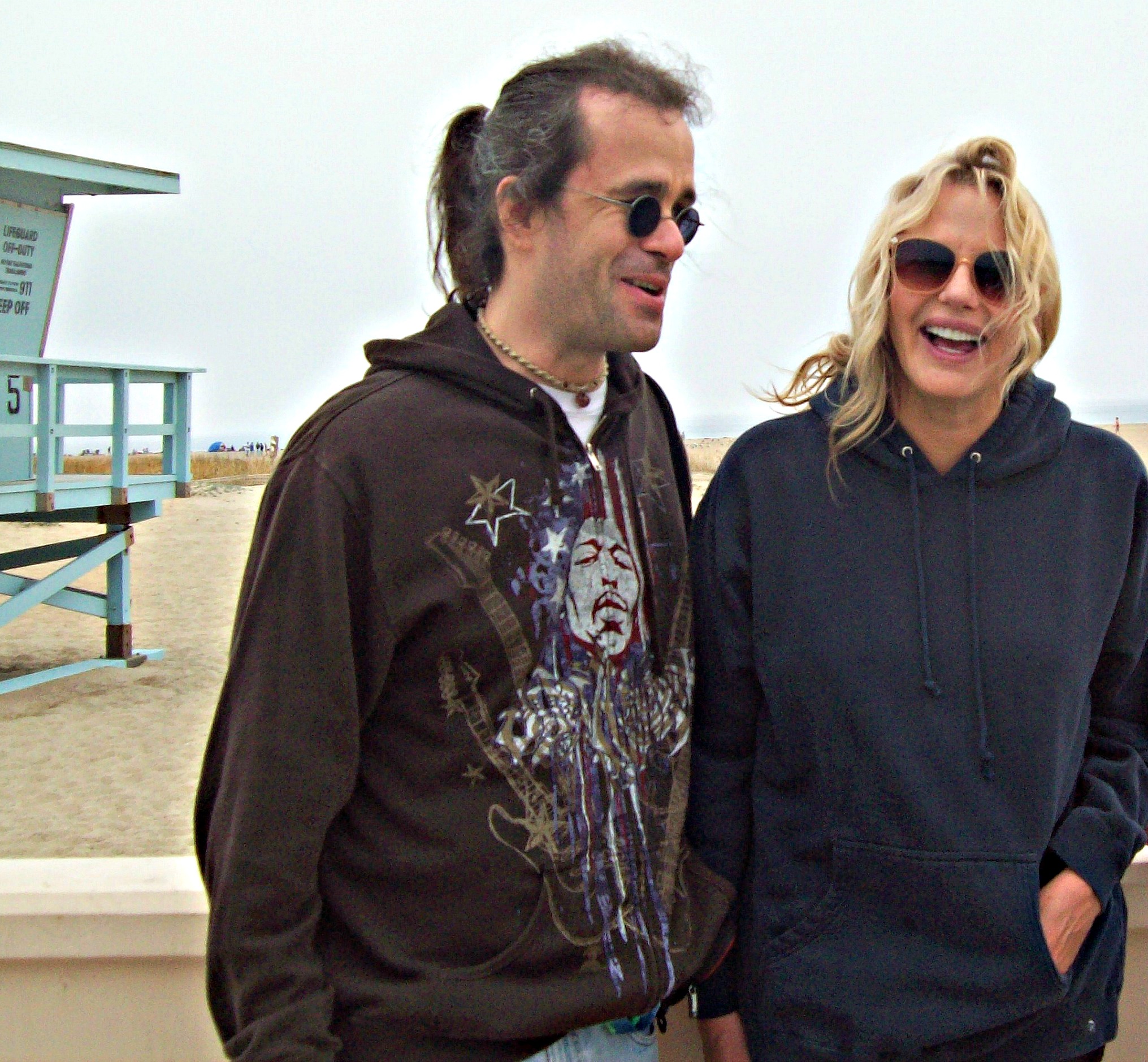 Me (back when I had a pony tail) making the stunning Daryl Hannah laugh.