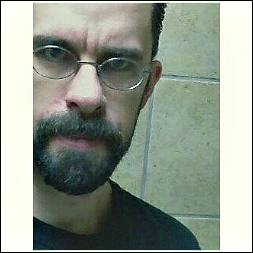 This is how I look with a beard. I look like I should be in a Rob Zombie film, don't I?