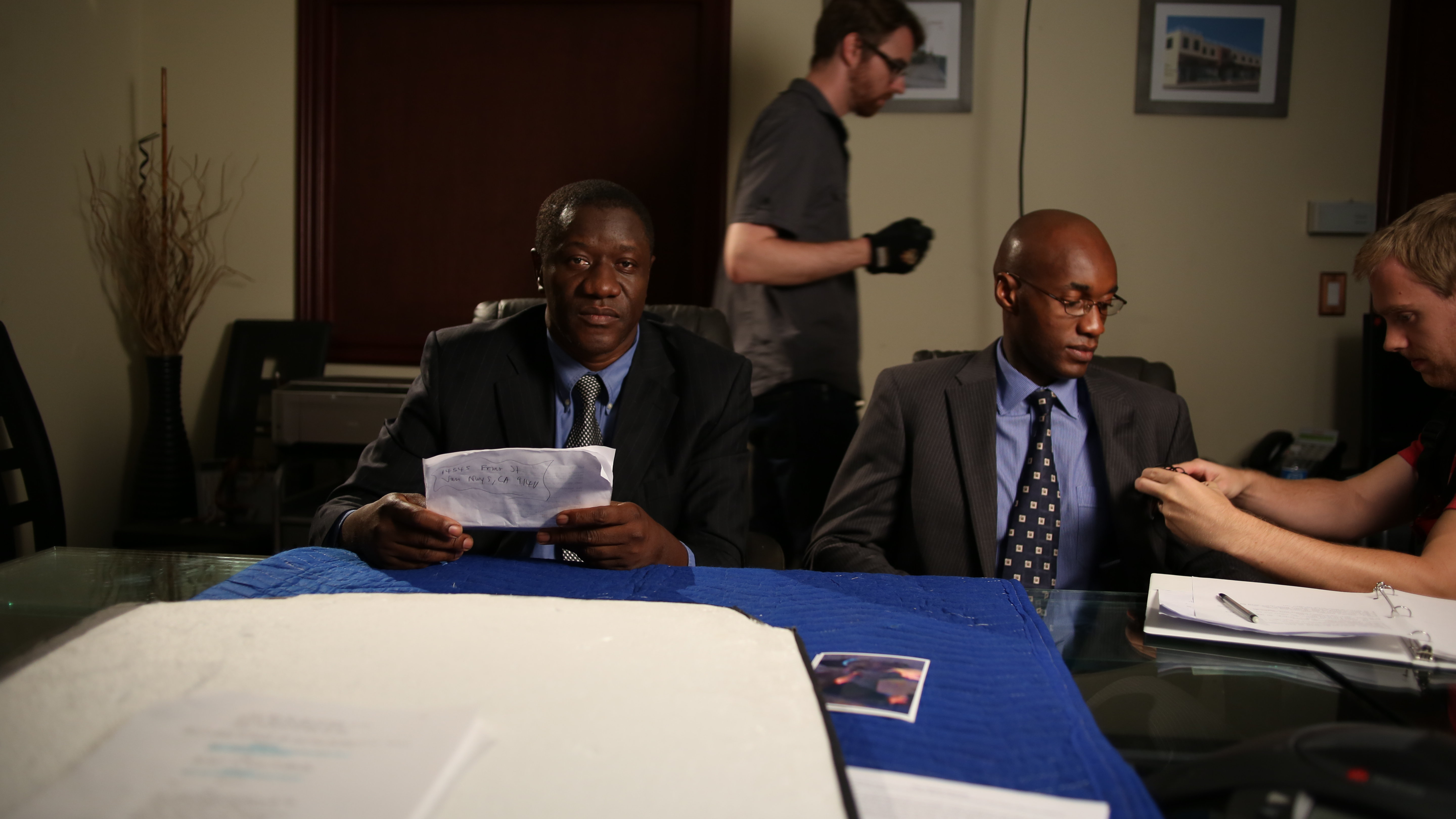 Benjamin A. Onyango, John Carlson, Tyler Neisinger and Tony Tambi in Chapter One (2012)