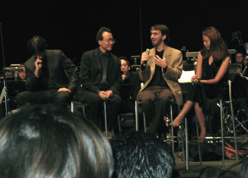 Adam Stein on stage with Yo-Yo Ma and Andrea Morricone, during a Q&A