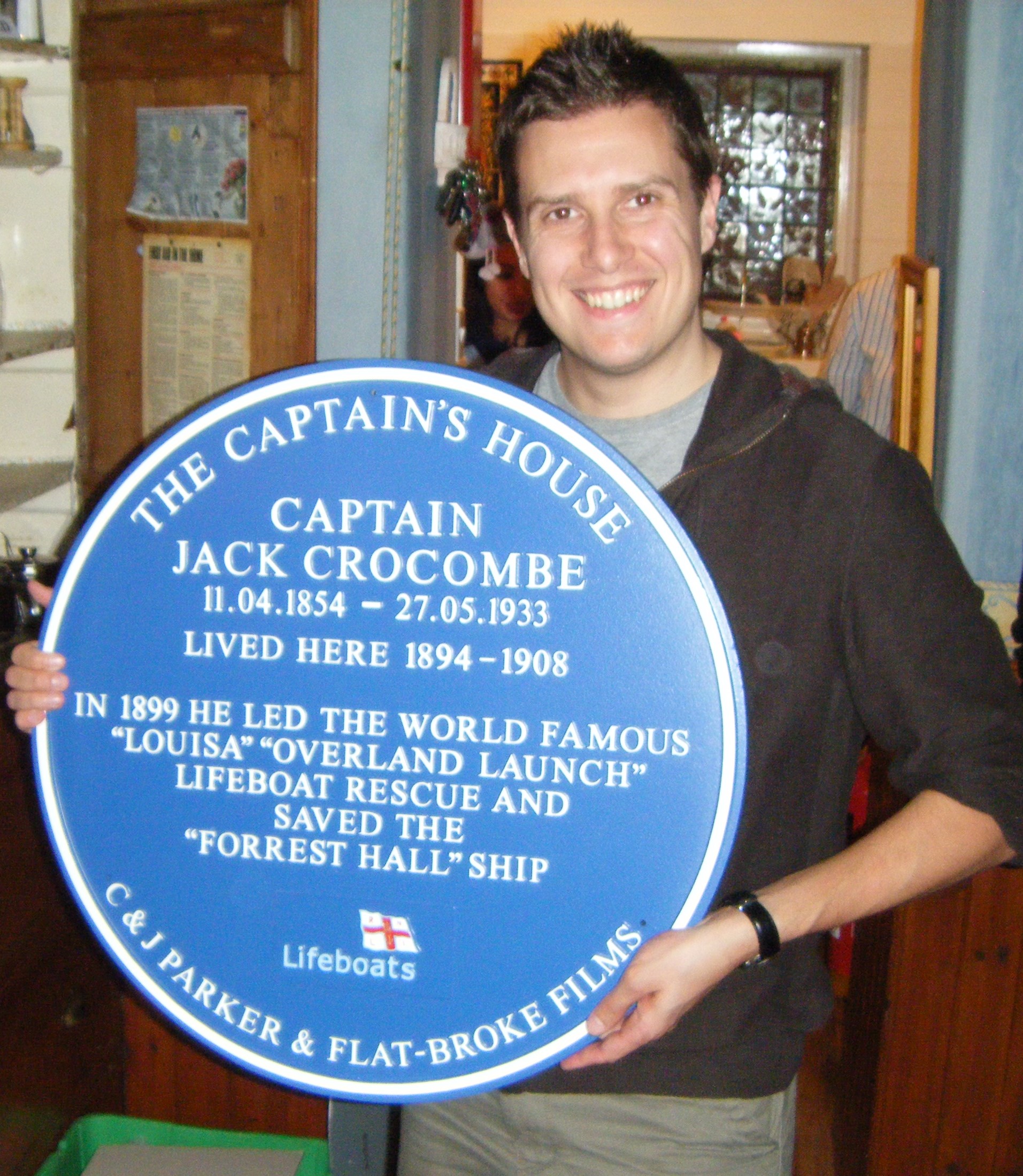 Louisa: A Winter's Tale screenwriter ADRIAN TYSON proudly holding a Blue Plaque erected at Jack Crocombe's house in October, 2010.